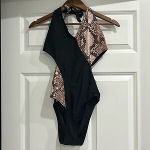 Snake print and black one piece bathing suit